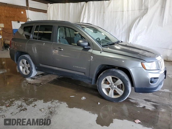 2014 Jeep Compass Sport with VIN 1C4NJDBB6ED592223, listed as a Copart auction lot 63343984 with 124,942 mi miles and Clean Title. Bid and sale history available at carsss.com. Image 4.
