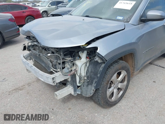 2018 Jeep Compass Latitude z VIN 3C4NJDBBXJT180665, wystawiony jako IAAI lot #41769618 z przebiegiem 128 309 mil mil oraz . Historia ofert i sprzedaży dostępna na DreamBid. Obrazek 17.
