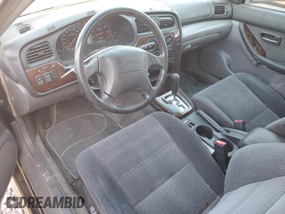 2003 Subaru Legacy Outback z VIN 4S3BH665X37650974, wystawiony jako Copart lot #41508225 z przebiegiem 166 975 mil mil oraz Szkoda całkowita • Salvage title. Historia ofert i sprzedaży dostępna na DreamBid. Obrazek 8.