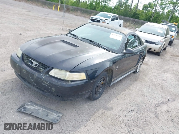 2000 Ford Mustang with VIN 1FAFP4048YF163834, listed as a IAAI auction lot 42090407 with 161,928 mi miles. Bid and sale history available at carsss.com. Image 2.