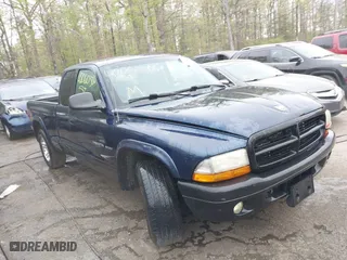 2002 Dodge Dakota Sport with VIN 1B7GL32X12S561414, listed as a IAAI auction lot 42060300 with 235,957 mi miles. Bid and sale history available at carsss.com. Image 1.