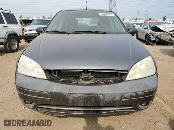2005 Ford Focus S with VIN 3FAFP37NX5R134987, listed as a Copart auction lot 60478825 with 204,927 mi miles and Clean title. Bid and sale history available at DreamBid. Image 5.