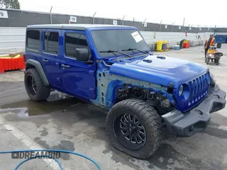 2019 Jeep Wrangler Unlimited Sport S с VIN 1C4HJXDNXKW646905, выставлен на аукционе IAAI как лот 42349348 с пробегом 94 737 миль миль и . История ставок и продаж доступна на DreamBid. Изображение 1.
