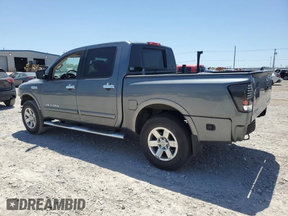2015 Nissan Titan Pro-4X with VIN 1N6BA0EC5FN514184, listed as a Copart auction lot 56721065 with 127,283 mi miles and Salvage title. Bid and sale history available at DreamBid. Image 2.