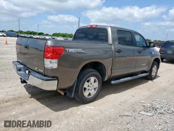 2010 Toyota Tundra with VIN 5TFDW5F12AX123529, listed as a Copart auction lot 60132615 with 264,205 mi miles and Clean title. Bid and sale history available at DreamBid. Image 3.