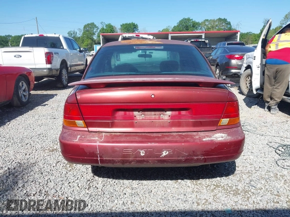1998 Saturn SL z VIN 1G8ZK5270WZ223002, wystawiony jako IAAI lot #41959507 z przebiegiem Nie podano mil oraz . Historia ofert i sprzedaży dostępna na DreamBid. Obrazek 16.