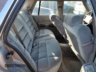 1991 Mercury Grand Marquis z VIN 2MECM74F4MX647208, wystawiony jako Copart lot #48439705 z przebiegiem 99 952 mil mil oraz Tytuł czysty. Historia ofert i sprzedaży dostępna na DreamBid. Obrazek 10.