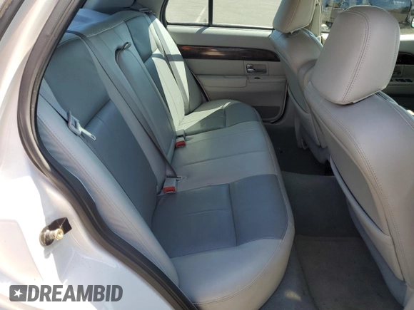 2005 Mercury Grand Marquis GS with VIN 2MEFM74W55X654070, listed as a Copart auction lot 53114785 with 56,128 mi miles and Salvage Title. Bid and sale history available at DreamBid. Image 10.