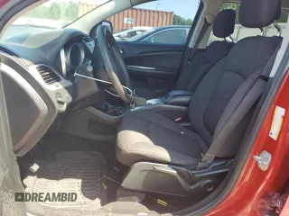 2017 Dodge Journey SXT with VIN 3C4PDCBB2HT562855, listed as a Copart auction lot 52499355 with 140,230 mi miles and Clean Title. Bid and sale history available at DreamBid. Image 7.
