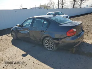 2007 BMW 3 Series 328xi with VIN WBAVC73557KP35114, listed as a Copart auction lot 51818055 with 225,165 mi miles and Salvage title. Bid and sale history available at DreamBid. Image 2.