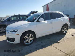 2015 Audi Q3 Premium Plus z VIN WA1BFCFSXFR009708, wystawiony jako Copart lot #88982135 z przebiegiem 146 063 mil mil oraz Czysty tytuł • Clean title. Historia ofert i sprzedaży dostępna na DreamBid. Obrazek 1.