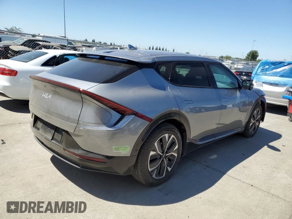 2022 Kia EV6 Wind with VIN KNDC3DLCXN5086669, listed as a Copart auction lot 68265344 with 74,711 mi miles and Salvage Title. Bid and sale history available at carsss.com. Image 3.