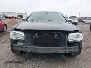 2016 Chrysler 300 with VIN 2C3CCAEG0GH348651, listed as a IAAI auction lot 41967981 with 141,728 mi miles. Bid and sale history available at carsss.com. Image 12.