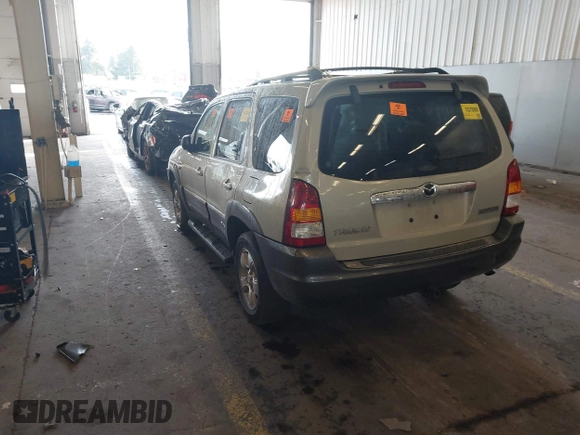 2004 Mazda Tribute ES with VIN 4F2CZ96104KM03252, listed as a IAAI auction lot 41153343 with 204,621 mi miles and . Bid and sale history available at carsss.com. Image 3.