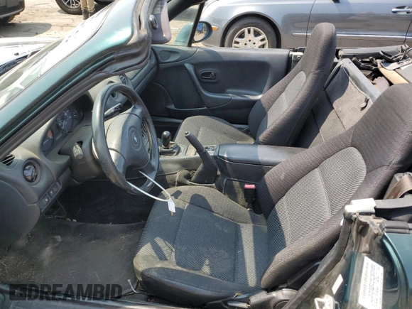 2000 Mazda MX-5 Miata with VIN JM1NB3533Y0151883, listed as a Copart auction lot 64423925 with 180,275 mi miles and Salvage title. Bid and sale history available at DreamBid. Image 7.