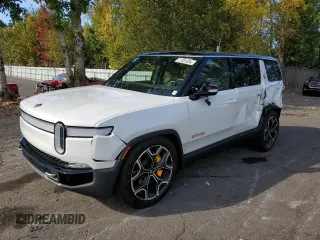 2024 Rivian R1S Adventure with VIN 7PDSGABAXRN035766, listed as a Copart auction lot 77481034 with 6,590 mi miles and Salvage Title. Bid and sale history available at carsss.com. Image 1.