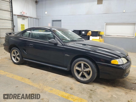 1997 Ford Mustang GT with VIN 1FALP42X4VF192088, listed as a Copart auction lot 84714114 with 194,845 mi miles and Salvage title. Bid and sale history available at DreamBid. Image 4.