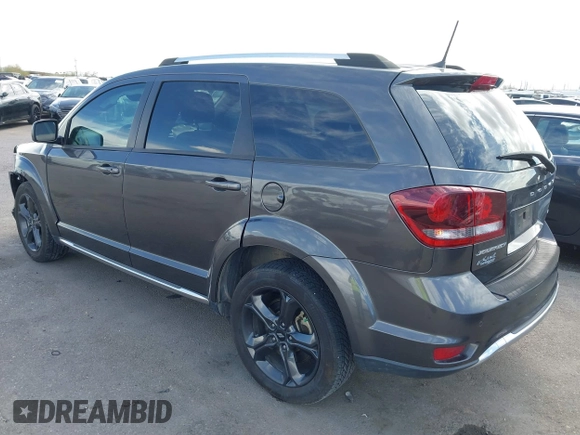2018 Dodge Journey Crossroad z VIN 3C4PDCGBXJT473775, wystawiony jako IAAI lot #41740081 z przebiegiem 98 286 mil mil oraz . Historia ofert i sprzedaży dostępna na DreamBid. Obrazek 3.