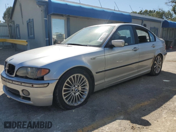 2003 BMW 3 Series 330xi with VIN WBAEW53413PG09450, listed as a Copart auction lot 74111954 with 252,295 mi miles and Salvage Title. Bid and sale history available at carsss.com. Image 1.