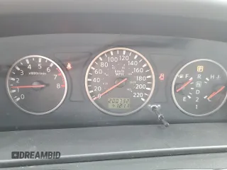 2006 Nissan X-Trail XE z VIN JN8BT08V96W209358, wystawiony jako Copart lot #81680624 z przebiegiem 200 732 mil mil oraz Szkody całkowita. Historia ofert i sprzedaży dostępna na DreamBid. Obrazek 9.