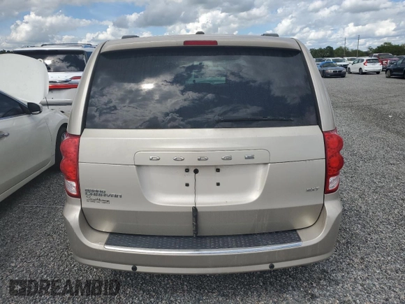 2014 Dodge Grand Caravan SXT 30th Anniversary with VIN 2C4RDGCG2ER328126, listed as a Copart auction lot 74277684 with Not Provided miles and Salvage Title. Bid and sale history available at DreamBid. Image 6.