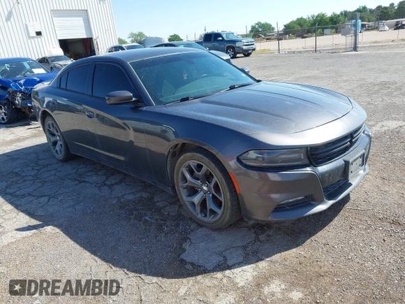 2015 Dodge Charger SXT with VIN 2C3CDXHG9FH825135, listed as a IAAI auction lot 42172793 with 169,324 mi miles and . Bid and sale history available at DreamBid. Image 1.