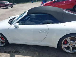 2014 Porsche 911 Carrera S z VIN WP0CB2A97ES154099, wystawiony jako IAAI lot #42264557 z przebiegiem 89 991 mil mil oraz . Historia ofert i sprzedaży dostępna na DreamBid. Obrazek 14.
