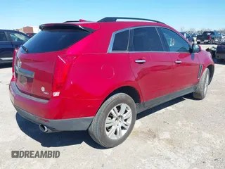 2014 Cadillac SRX with VIN 3GYFNAE36ES597007, listed as a IAAI auction lot 41675527 with 105,613 mi miles and . Bid and sale history available at DreamBid. Image 4.