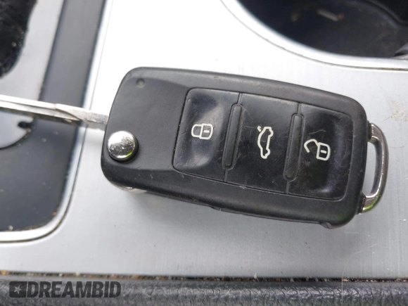 2013 Volkswagen Passat SE with VIN 1VWBP7A31DC017929, listed as a IAAI auction lot 42174320 with 169,596 mi miles and . Bid and sale history available at DreamBid. Image 11.