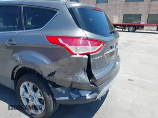 2013 Ford Escape SEL with VIN 1FMCU0HX0DUC16069, listed as a IAAI auction lot 42638924 with 80,200 mi miles and . Bid and sale history available at DreamBid. Image 6.