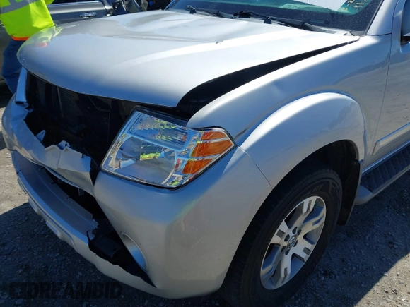2012 Nissan Pathfinder SV z VIN 5N1AR1NBXCC623537, wystawiony jako IAAI lot #41816762 z przebiegiem 177 261 mil mil oraz . Historia ofert i sprzedaży dostępna na DreamBid. Obrazek 17.