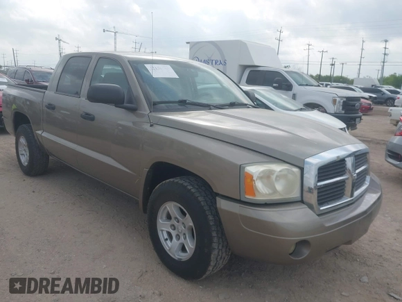 2006 Dodge Dakota SLT with VIN 1D7HE48N16S703072, listed as a IAAI auction lot 42156709 with 102,919 mi miles. Bid and sale history available at carsss.com. Image 1.