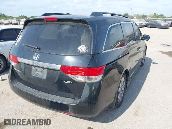 2015 Honda Odyssey EX-L with VIN 5FNRL5H68FB094983, listed as a IAAI auction lot 42031539 with 231,144 mi miles and . Bid and sale history available at DreamBid. Image 4.
