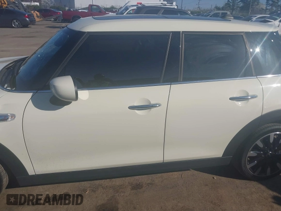 2021 MINI Hardtop 4 Door Cooper S with VIN WMWXU9C00M2P04693, listed as a IAAI auction lot 41785185 with 57,848 mi miles and . Bid and sale history available at DreamBid. Image 14.