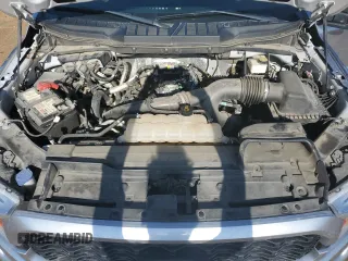2021 Ford F-150 XL z VIN 1FTEW1CP3MFA58688, wystawiony jako Copart lot #56254525 z przebiegiem 60 792 mil mil oraz Szkoda całkowita • Salvage title. Historia ofert i sprzedaży dostępna na DreamBid. Obrazek 11.