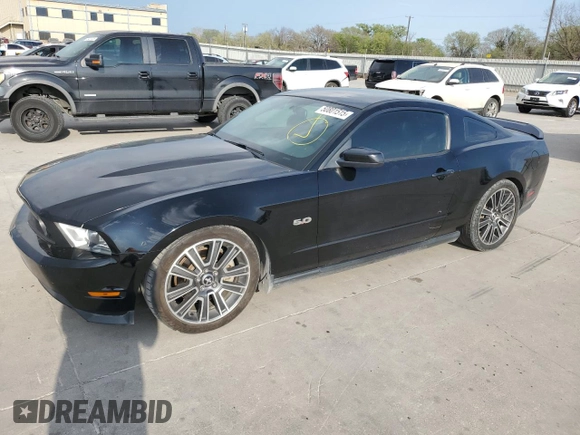 2012 Ford Mustang GT Premium with VIN 1ZVBP8CF0C5251771, listed as a Copart auction lot 50801515 with 104,833 mi miles and Salvage Title. Bid and sale history available at DreamBid. Image 1.