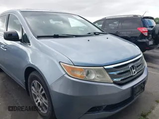 2012 Honda Odyssey EX-L with VIN 5FNRL5H60CB095086, listed as a IAAI auction lot 42251330 with 144,232 mi miles and . Bid and sale history available at DreamBid. Image 12.