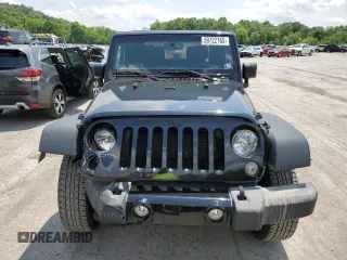 2015 Jeep Wrangler Freedom Edition with VIN 1C4AJWAG8FL688255, listed as a Copart auction lot 59722165 with 130,666 mi miles and Salvage title. Bid and sale history available at DreamBid. Image 5.