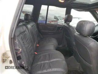 1998 Jeep Grand Cherokee Limited with VIN 1J4GZ88Z4WC164505, listed as a Copart auction lot 76843304 with 0 mi miles and Salvage Title. Bid and sale history available at carsss.com. Image 11.