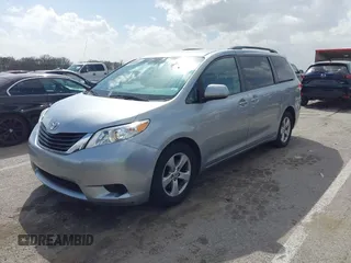 2014 Toyota Sienna LE AAS with VIN 5TDKK3DC2ES440251, listed as a IAAI auction lot 41803952 with 88,691 mi miles. Bid and sale history available at carsss.com. Image 2.