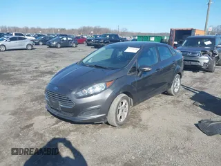 2015 Ford Fiesta SE z VIN 3FADP4BJ5FM219915, wystawiony jako IAAI lot #41725718 z przebiegiem 153 136 mil mil oraz . Historia ofert i sprzedaży dostępna na DreamBid. Obrazek 2.