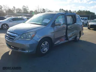2007 Honda Odyssey EX-L with VIN 5FNRL38627B132925, listed as a IAAI auction lot 41793141 with 168,000 mi miles. Bid and sale history available at carsss.com. Image 2.