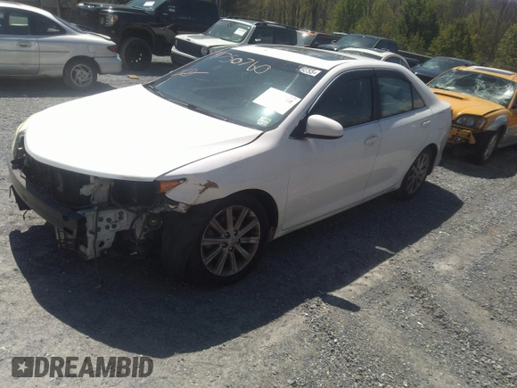 2014 Toyota Camry L with VIN 4T4BF1FK0ER340899, listed as a IAAI auction lot 41750760 with 179,934 mi miles. Bid and sale history available at carsss.com. Image 2.