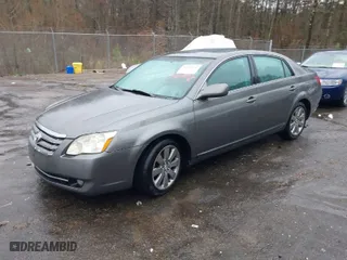 2007 Toyota Avalon XL with VIN 4T1BK36B27U204147, listed as a IAAI auction lot 41585882 with 166,303 mi miles. Bid and sale history available at carsss.com. Image 2.