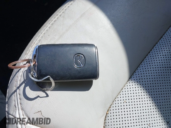 2020 Mazda CX-5 Grand Touring with VIN JM3KFADM3L0761286, listed as a IAAI auction lot 41715379 with 145,656 mi miles and . Bid and sale history available at DreamBid. Image 11.