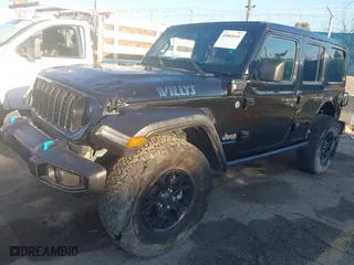 2024 Jeep Wrangler 4xe Willys with VIN 1C4RJXN6XRW215633, listed as a IAAI auction lot 41861641 with 3,927 mi miles. Bid and sale history available at carsss.com. Image 21.