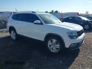 2018 Volkswagen Atlas SEL Premium with VIN 1V2NR2CA5JC571171, listed as a IAAI auction lot 42174807 with 131,690 mi miles and . Bid and sale history available at DreamBid. Image 1.