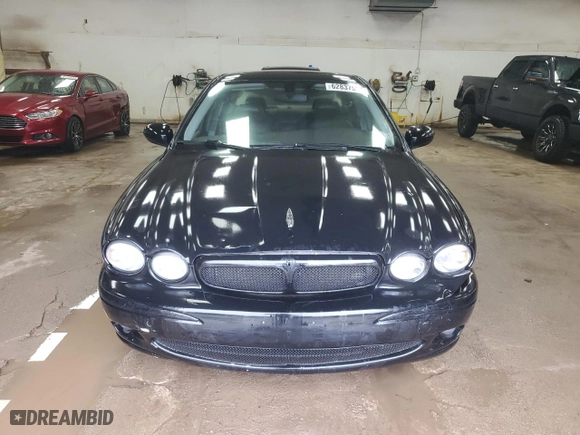 2005 Jaguar X-Type 3.0L with VIN SAJWA51C05WE41522, listed as a Copart auction lot 62837564 with 91,885 mi miles and Clean Title. Bid and sale history available at carsss.com. Image 5.