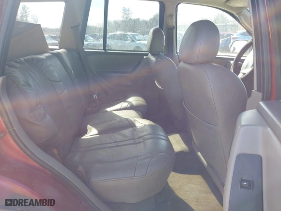 2003 Jeep Grand Cherokee Laredo with VIN 1J4GW48S33C556441, listed as a IAAI auction lot 42026804 with 189,143 mi miles. Bid and sale history available at carsss.com. Image 8.