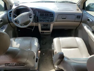 2000 Toyota Sienna LE with VIN 4T3ZF13C2YU286474, listed as a Copart auction lot 74230384 with 118,988 mi miles and Salvage Title. Bid and sale history available at carsss.com. Image 8.